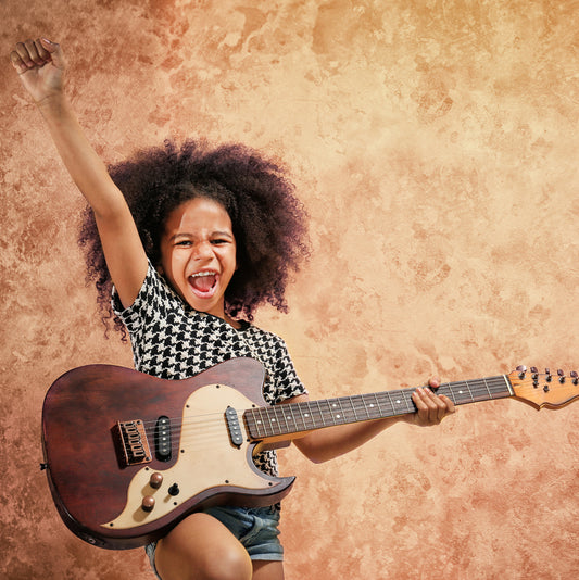 How To Teach Your Kids To Rock (& why it's good for them)