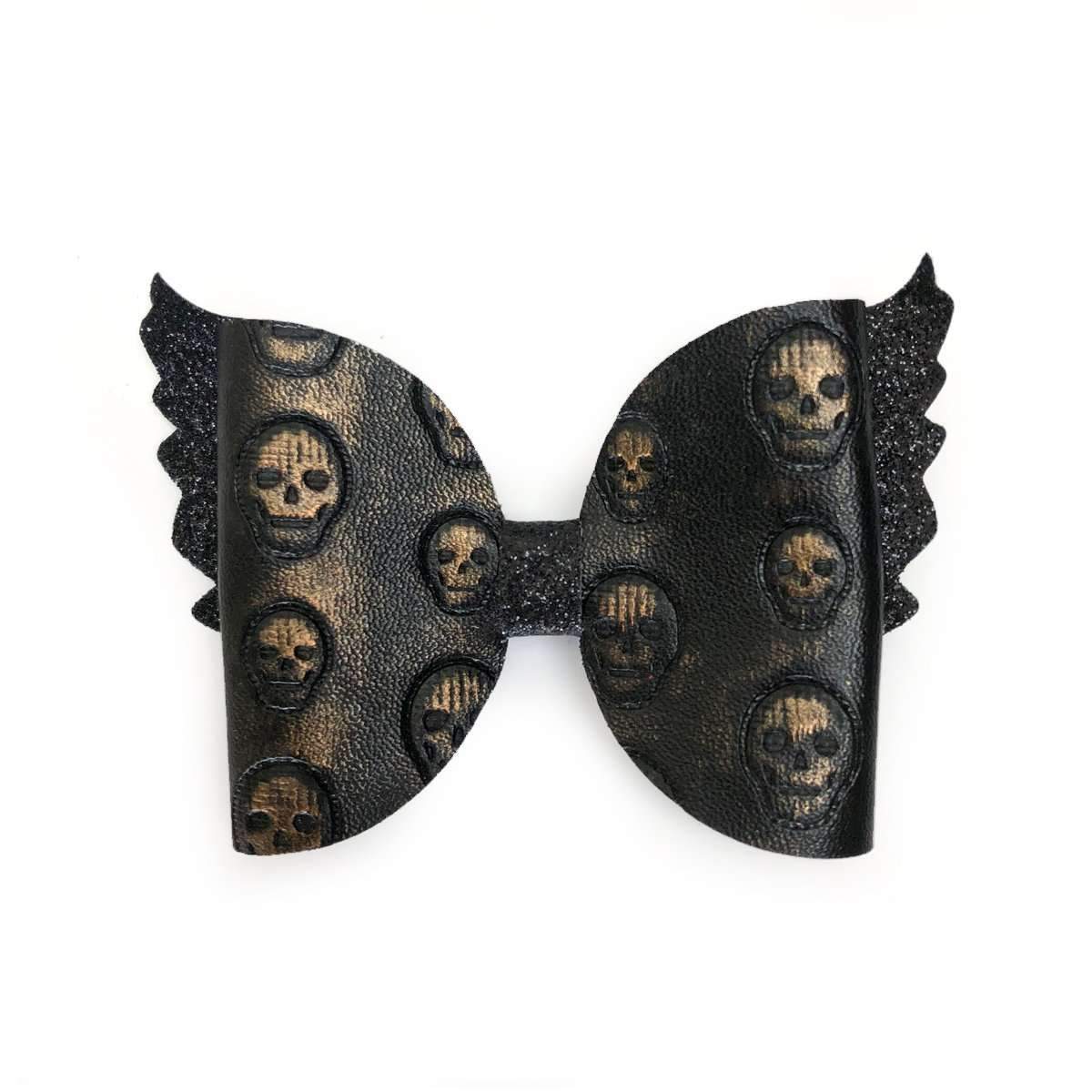black faux leather hair bow with skulls