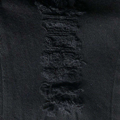 Kids jeans black ripped denim close up detail