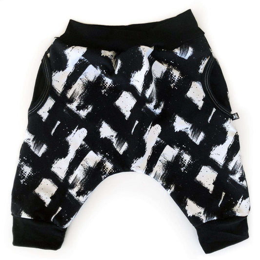 Kids grungy shorts in cotton lycra. black and white grunge pattern