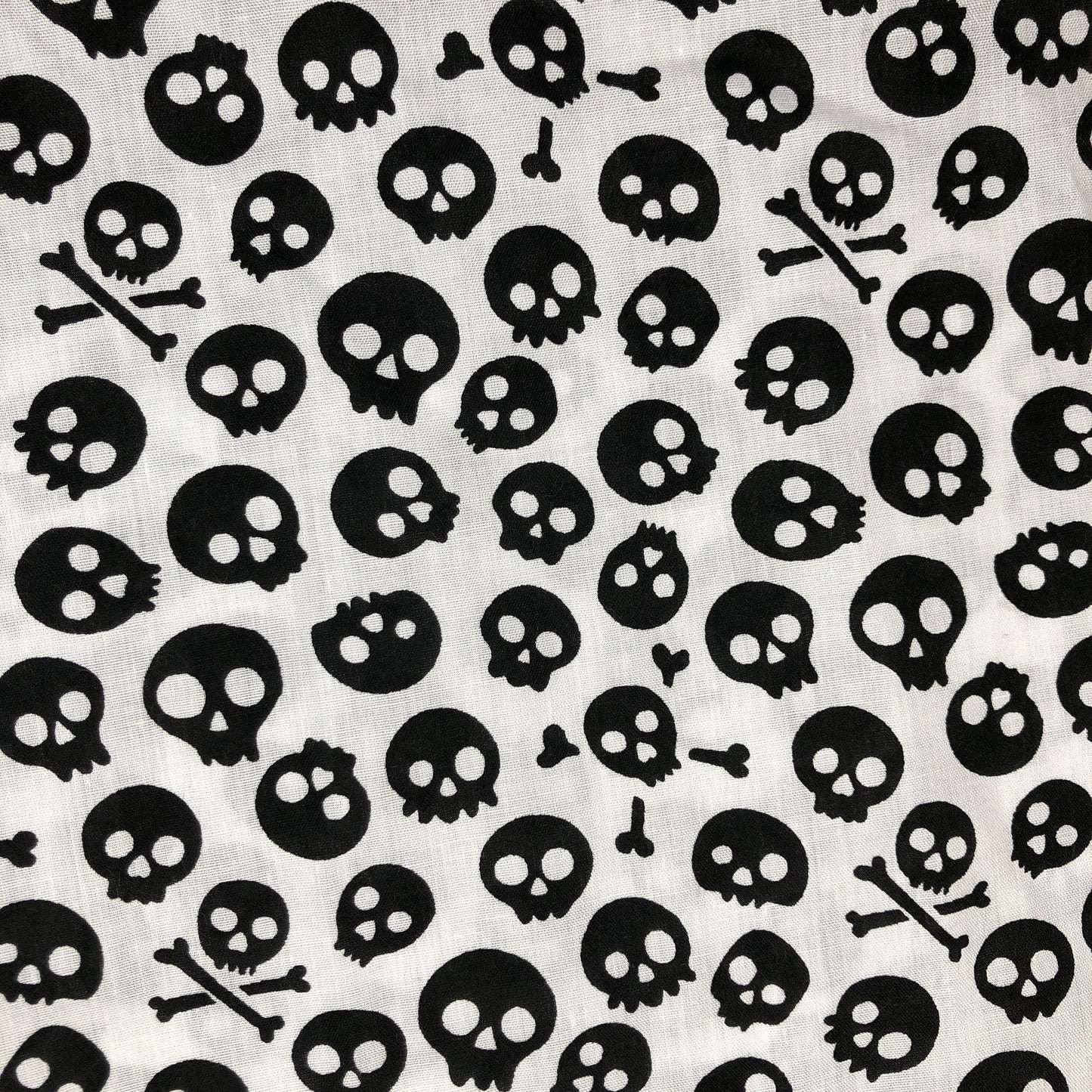 black skulls on white background